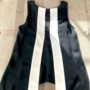 Parker size XS black and white, short front, longer and open back
